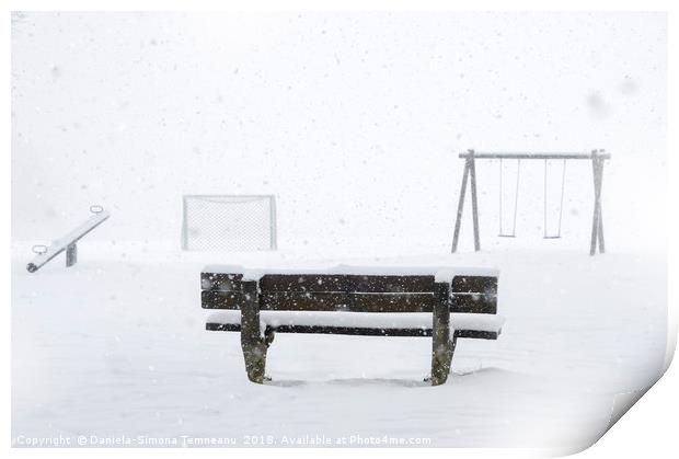 Playground and bench covered by snow Print by Daniela Simona Temneanu