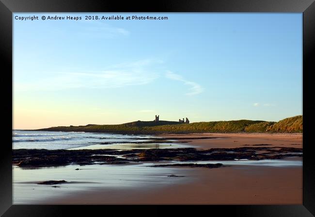 Majestic dawn over Dunstanburgh Castle Framed Print by Andrew Heaps