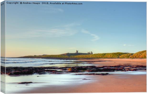Sunrise looking over Dunstanburgh Castle HDR Canvas Print by Andrew Heaps