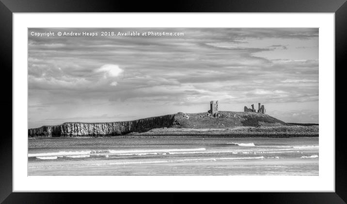 Dunstanburgh Castle from the beach. Framed Mounted Print by Andrew Heaps