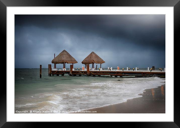 pier with a pair of palapa's              Framed Mounted Print by Angela Wallace