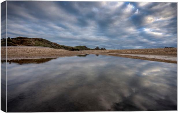 Reflections at Three Cliffs Bay Canvas Print by Leighton Collins