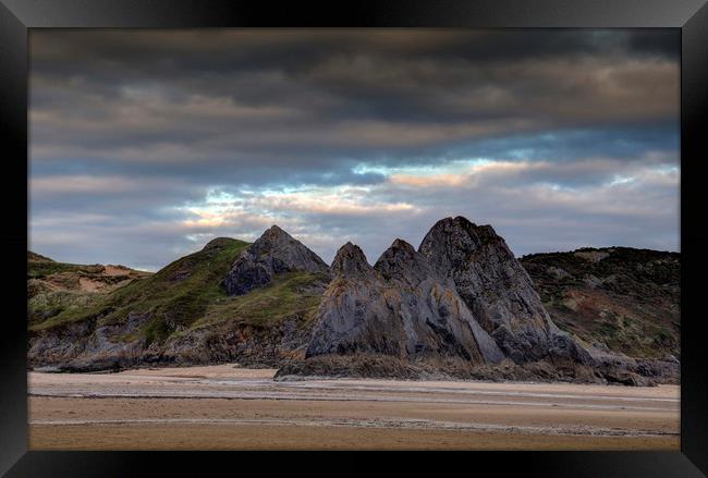 Jagged Three Cliffs Bay Framed Print by Leighton Collins