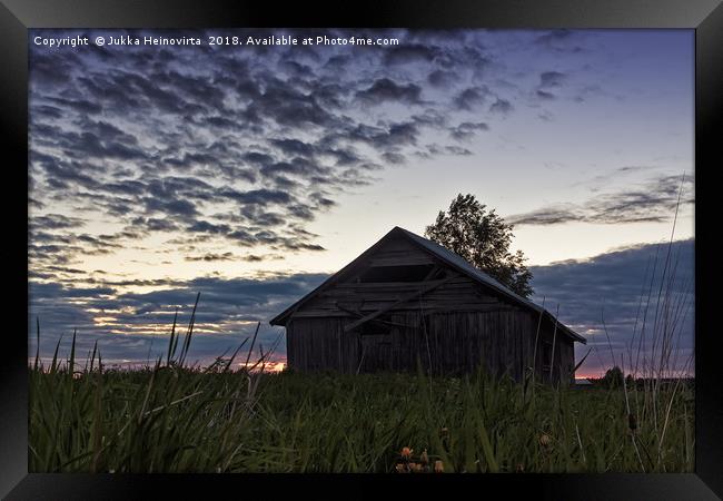 Midsummer Sun Sets Behind An Old Barn House Framed Print by Jukka Heinovirta
