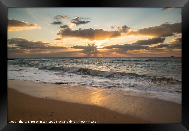 Sun rays and sea Framed Print by Kate Whiston