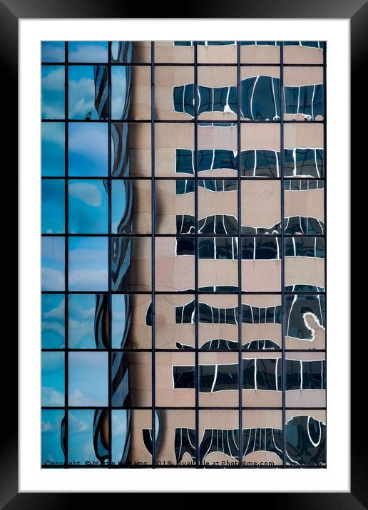 A distorted reflection of an office block in the r Framed Mounted Print by Martin Williams