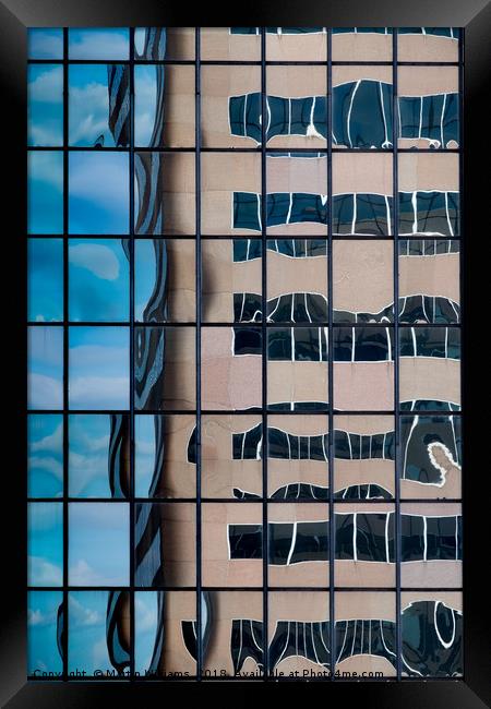 A distorted reflection of an office block in the r Framed Print by Martin Williams