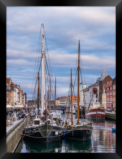 The old harbour area of Nyhan in Copenhagen Framed Print by George Robertson