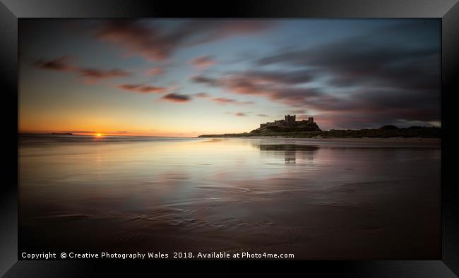 Bamburgh Castle Coastal Lanbdscape Framed Print by Creative Photography Wales