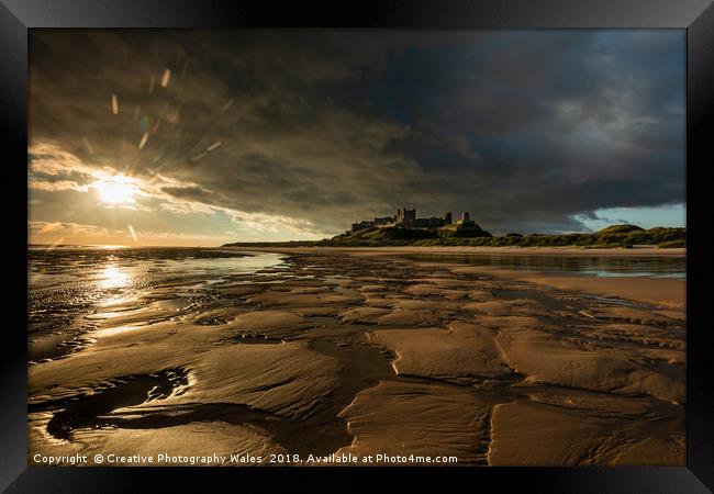 Bamburgh Castle Coastal Lanbdscape Framed Print by Creative Photography Wales