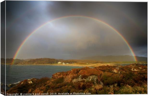 Full rainbow over Traigh, Scotland west coast Canvas Print by yvonne & paul carroll