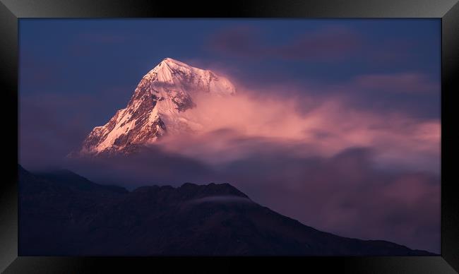 Clouds clearing on Annapurna South Framed Print by George Robertson
