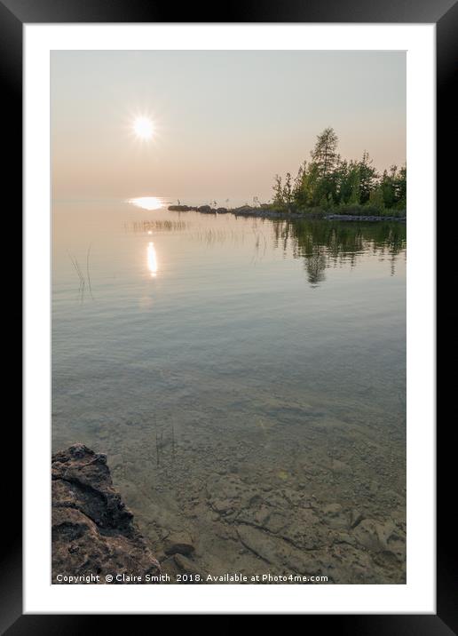 Beautiful calm sunset on the clear Lake Huron  Framed Mounted Print by Claire Smith