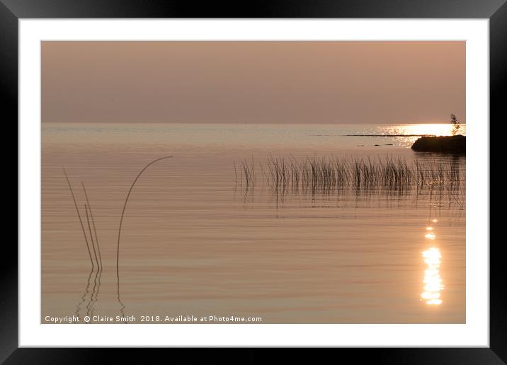 Beautiful calm sunset on the Lake Huron Shoreline  Framed Mounted Print by Claire Smith