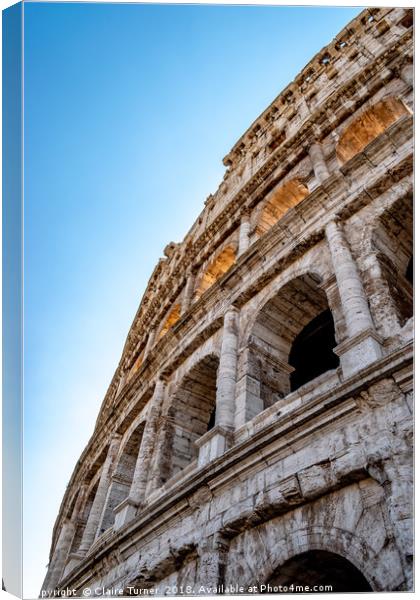 Close up perspective of the Colosseum Canvas Print by Claire Turner