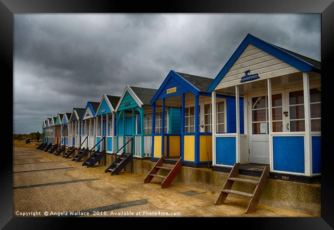 Beach huts at Southwold                    Framed Print by Angela Wallace