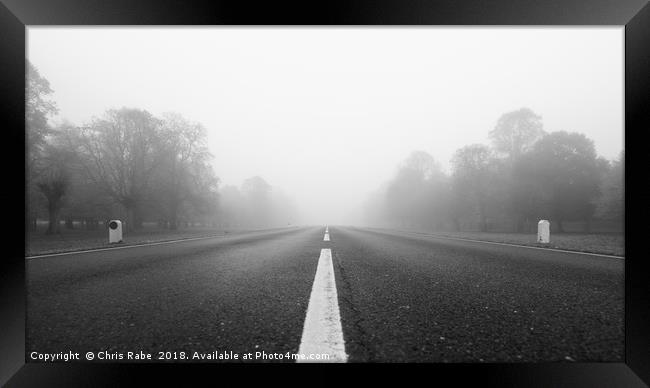 Low view down Foggy road  Framed Print by Chris Rabe