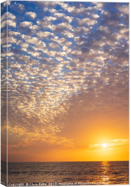 Sea, sun and clouds Canvas Print by Chris Rabe