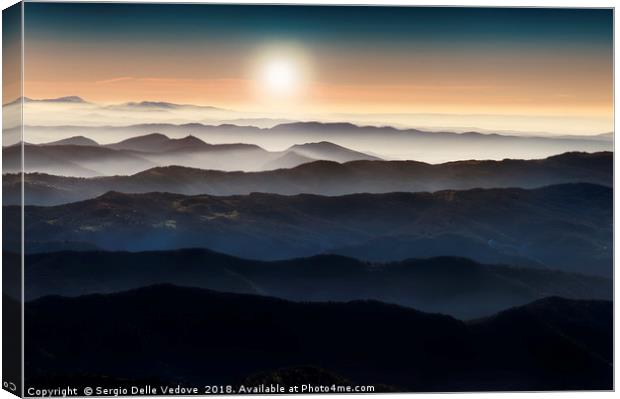 the sun over the mountains Canvas Print by Sergio Delle Vedove