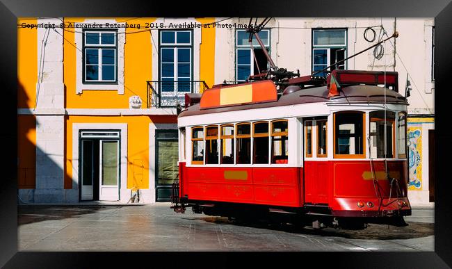 Vintage red and white tram on the street of Lisbon Framed Print by Alexandre Rotenberg