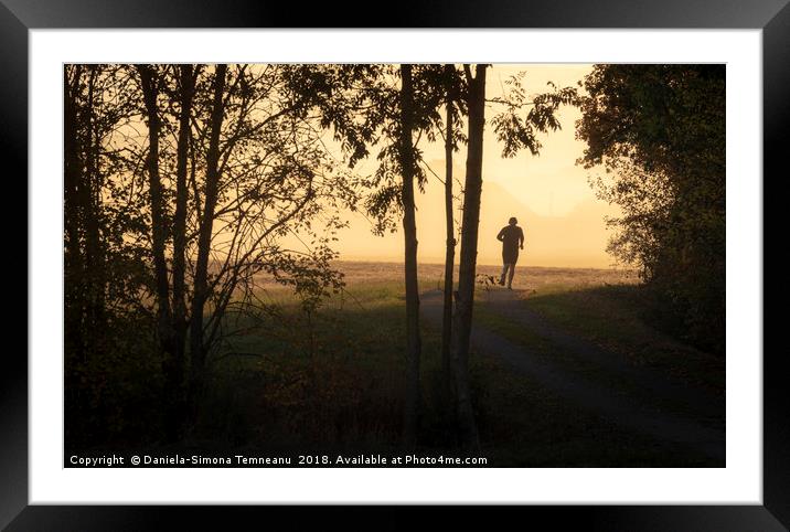 Man jogger at sunrise Framed Mounted Print by Daniela Simona Temneanu