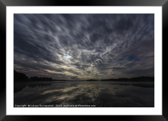 Dynamic clouds in the night over the lake lit by f Framed Mounted Print by Łukasz Szczepański