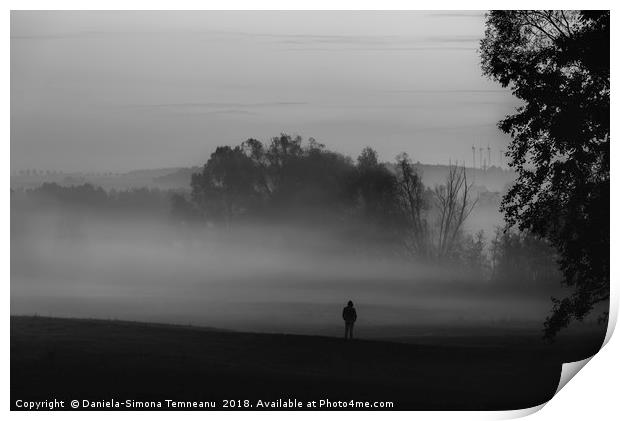 Man standing alone in darkness and fog Print by Daniela Simona Temneanu