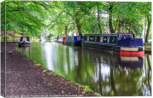 Narrowboats in canal basin Canvas Print by Kevin Hellon