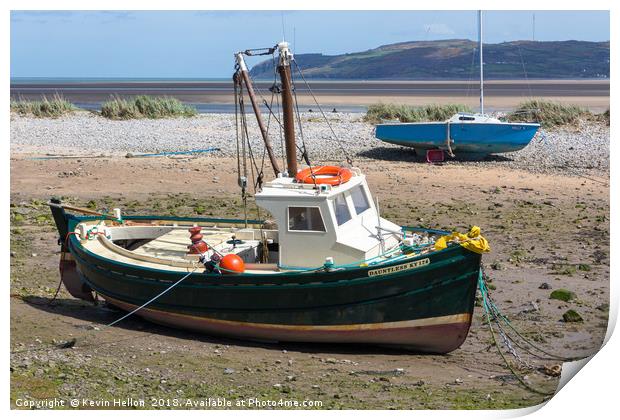 Boats moored in Red Wharf BayAnglesey at low tide. Print by Kevin Hellon