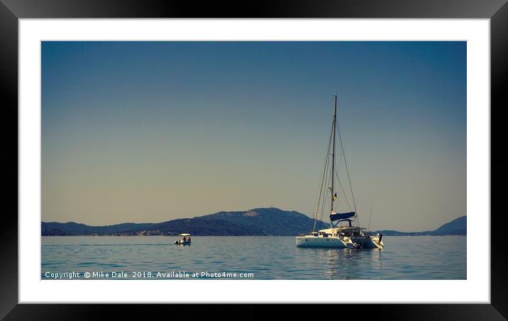                      A white yacht moored off Paxo Framed Mounted Print by Mike Dale