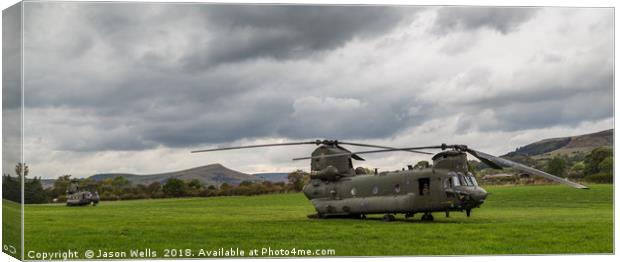 Chinook helicopters in a field Canvas Print by Jason Wells