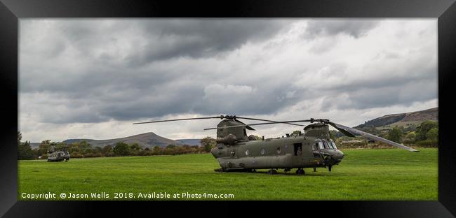 Chinook helicopters in a field Framed Print by Jason Wells