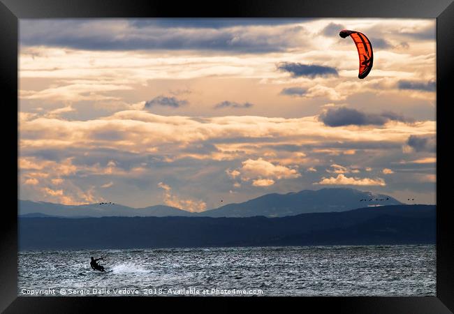 kitesurfing on the sea Framed Print by Sergio Delle Vedove