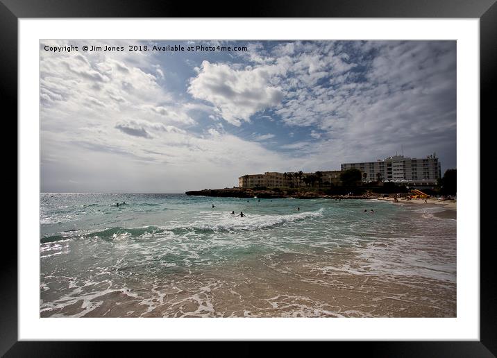 Swimmers on the beach at Cala'n Bosch, Menorca Framed Mounted Print by Jim Jones