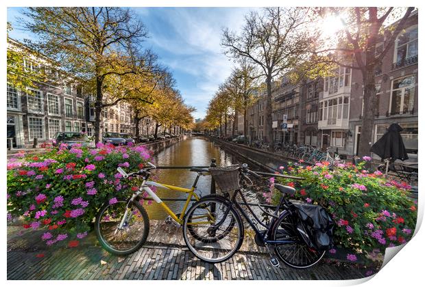 Iconic Amsterdam canal view with bicycle parked be Print by Ankor Light