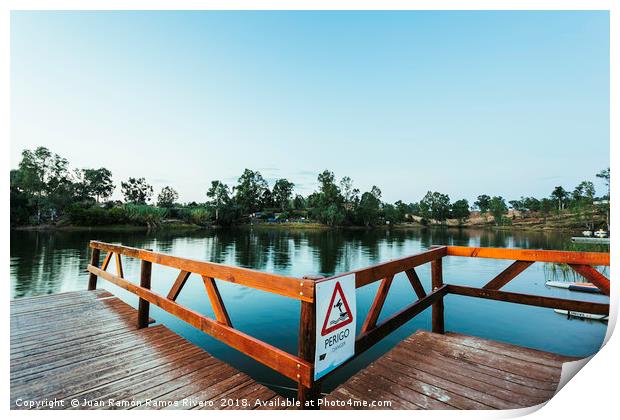 Wooden jetty with danger sign jumping into the wat Print by Juan Ramón Ramos Rivero