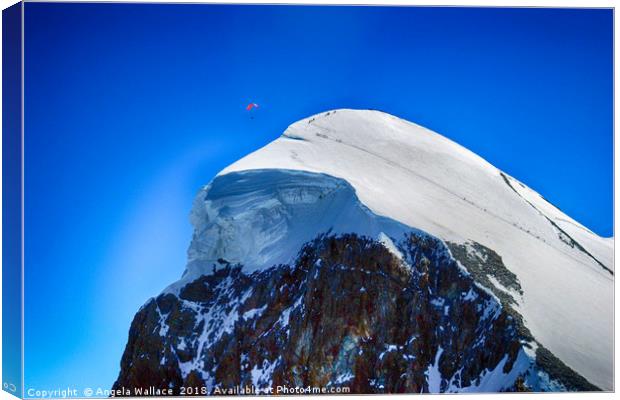 Paragliding at the Mtterhorn Canvas Print by Angela Wallace