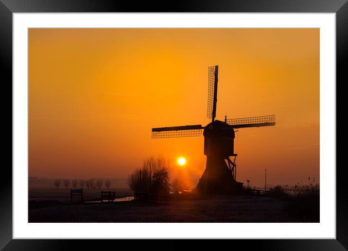 Warm sunrise on the Kinderdijk windmill in Rotterd Framed Mounted Print by Ankor Light