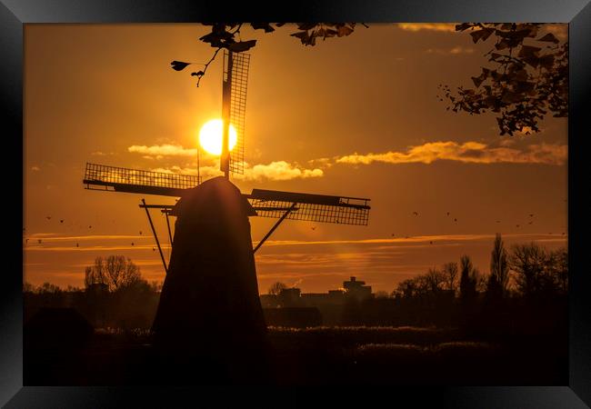 Windmill at the warm and red color sunrise Framed Print by Ankor Light