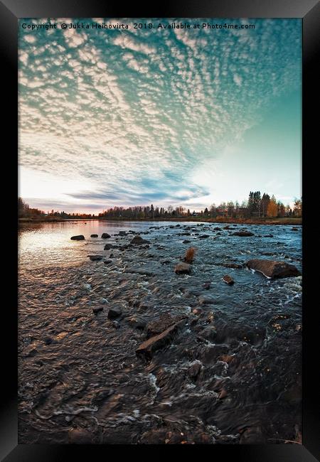 Sunset Over The River Rocks Framed Print by Jukka Heinovirta