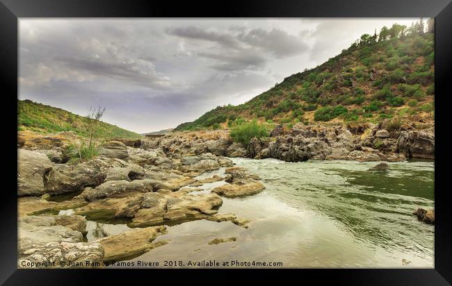  Guadiana river going down between the rocks and m Framed Print by Juan Ramón Ramos Rivero