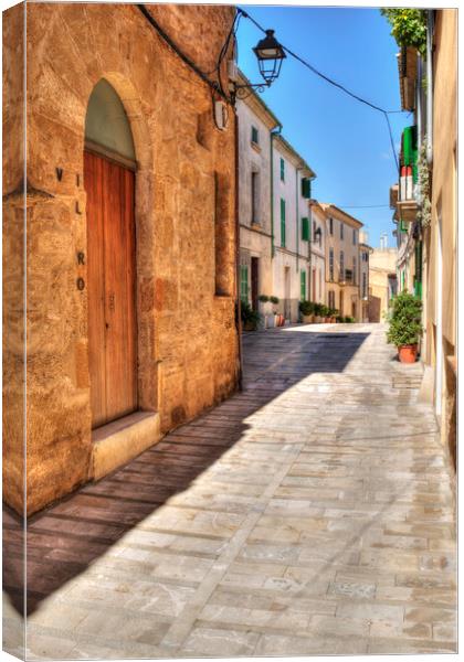 Alcudia old town Canvas Print by Perry Johnson