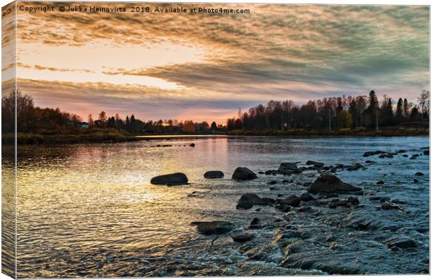 Sunset Over The Rapids Canvas Print by Jukka Heinovirta