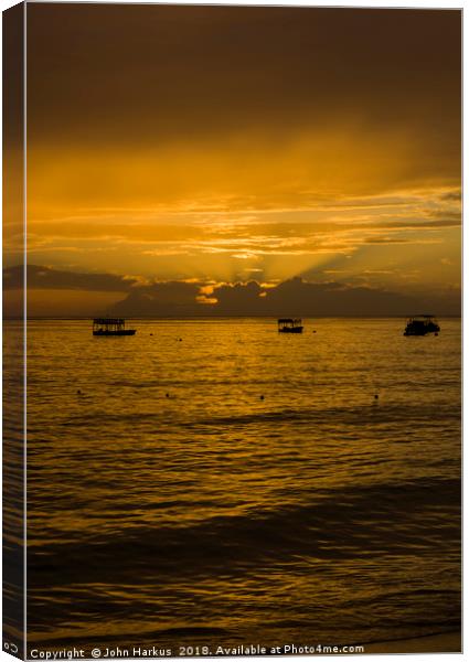 Sunset in Barbados Canvas Print by John Harkus
