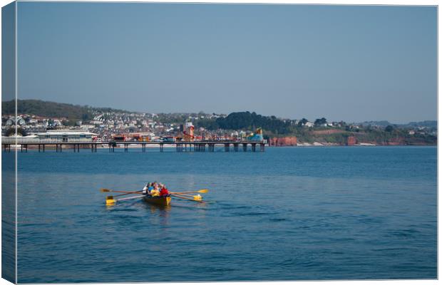 Rowing gig at Paignton Canvas Print by Simon J Beer