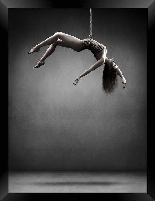 Woman hanging on a rope Framed Print by Johan Swanepoel
