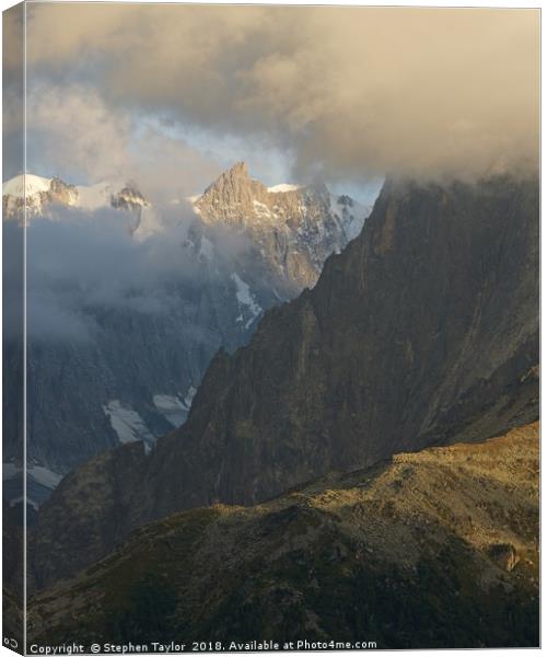 Golden Light catches the peak of Grandes Jorasses Canvas Print by Stephen Taylor