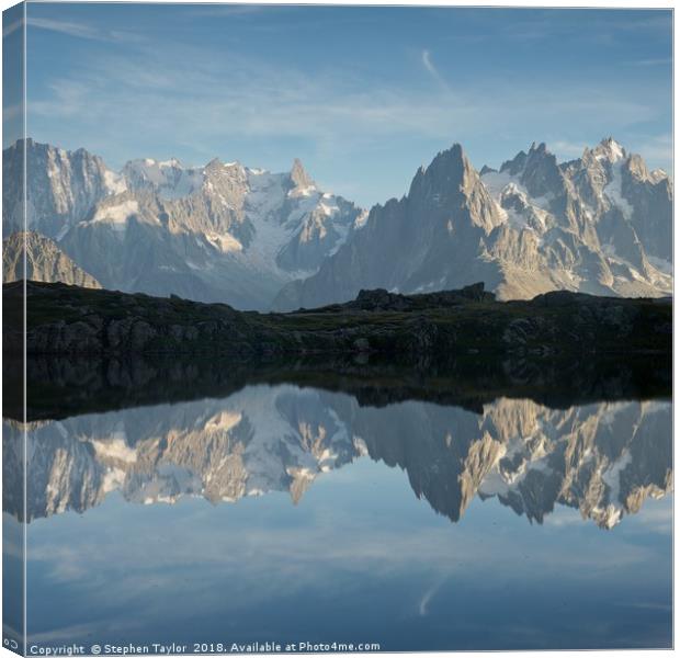 Lac des Cheserys reflection Canvas Print by Stephen Taylor