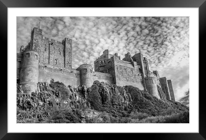 Bamburgh Castle view in Mono Framed Mounted Print by Naylor's Photography