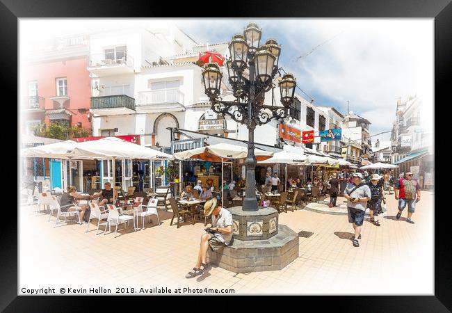 Shoppers in a pedestrianised street. Framed Print by Kevin Hellon